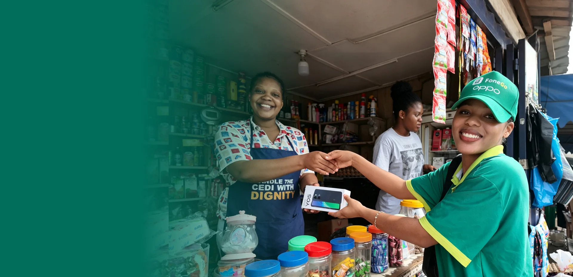 FoneGo representative handing a smartphone to a customer