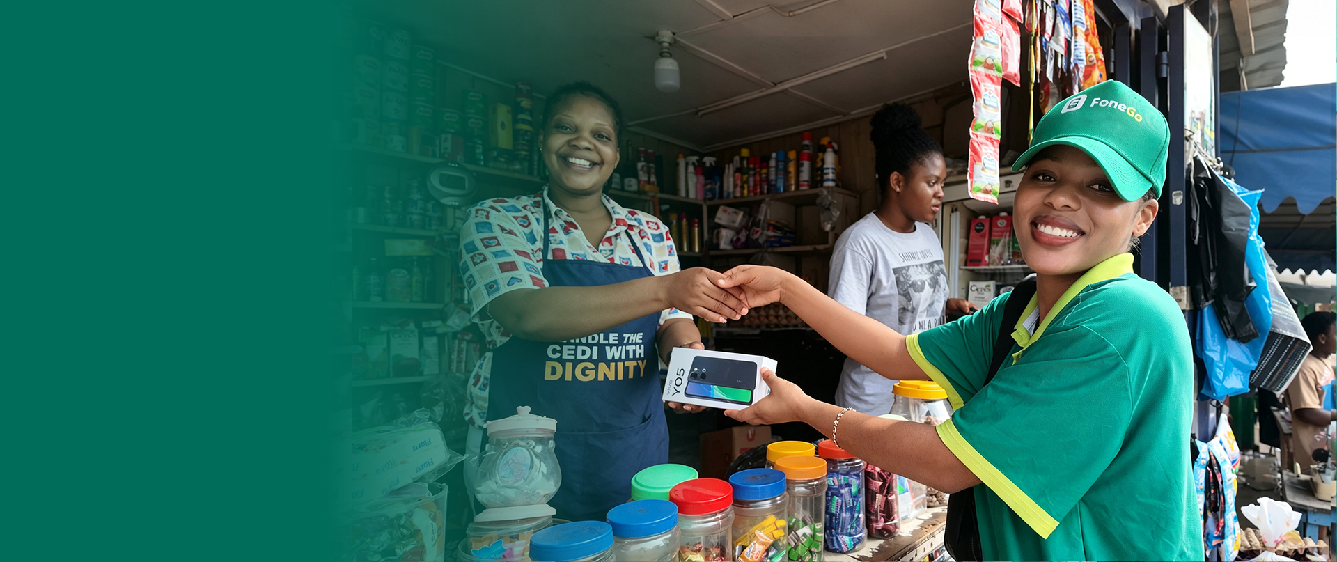FoneGo representative handing a smartphone to a customer